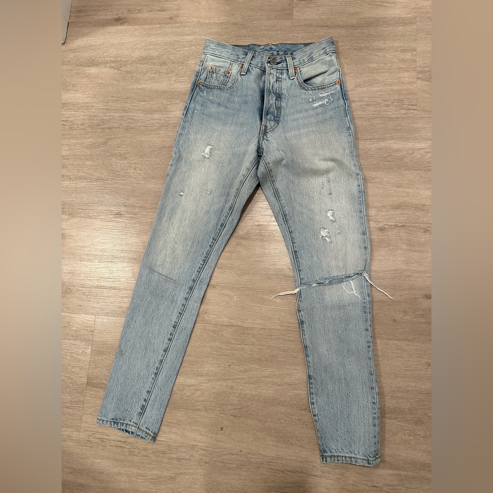 Light washed distressed Levi’s 501s ( not vintage kind)